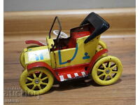 Old metal mechanical toy model retro car