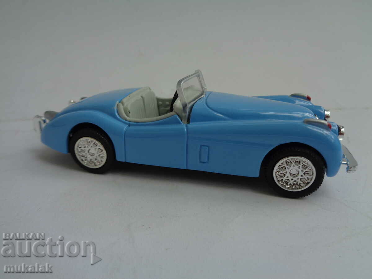 Auction  1:43 NEW RAY JAGUAR XK RETRO MODEL CAR