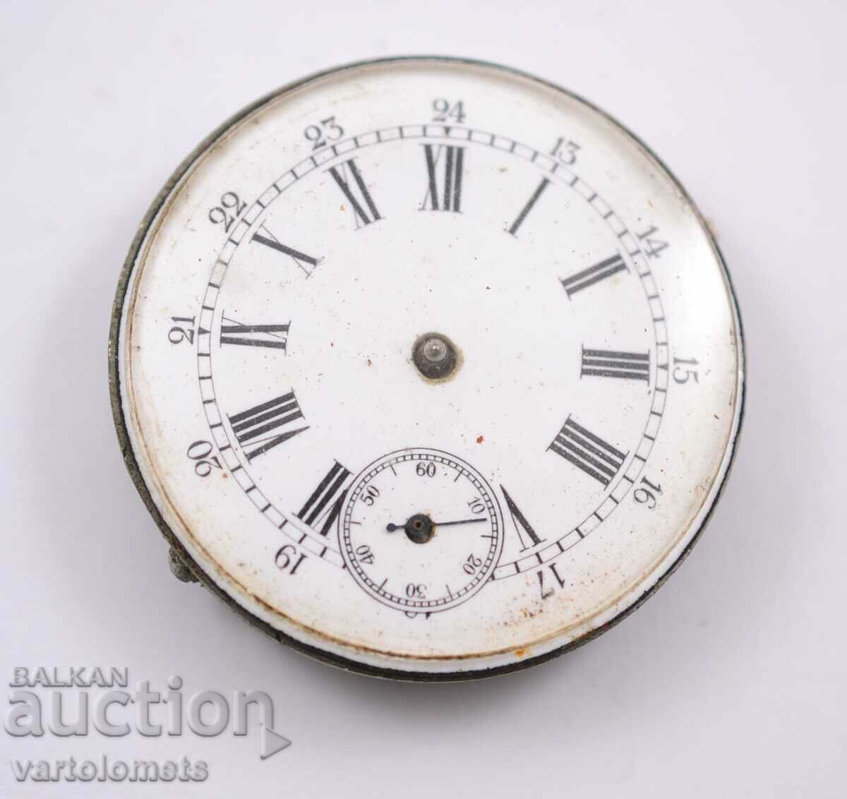 Механизъм на старинен  джобен часовник -  работи