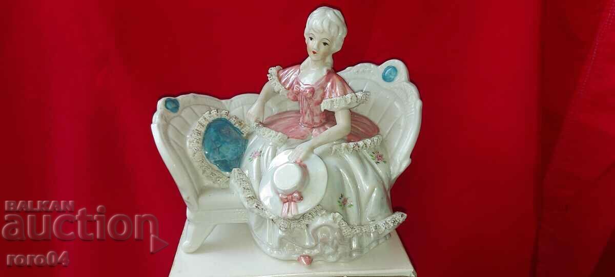 PORCELAIN STATUETTE