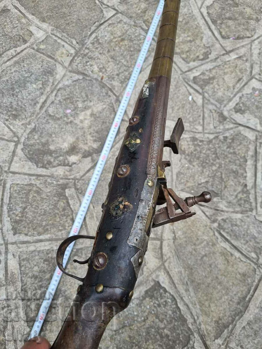 An old rifle. - 7 An old rifle. - 7