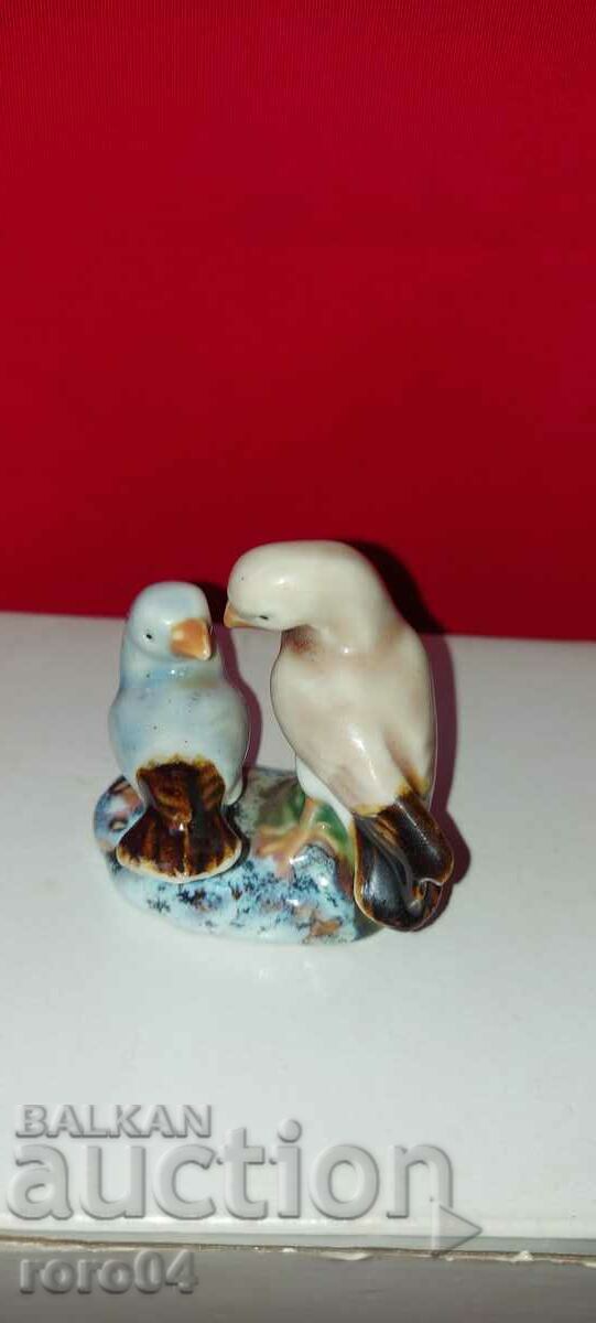 Auction PORCELAIN STATUETTE Auction PORCELAIN STATUETTE