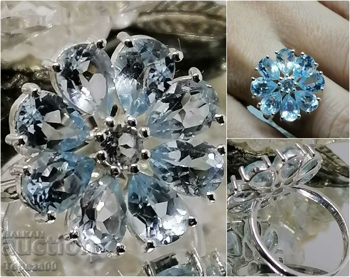 Нежен сребърен пръстен със син топаз