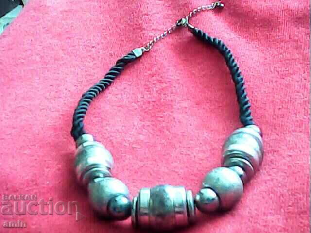 old beautiful necklace with silver-plated balls