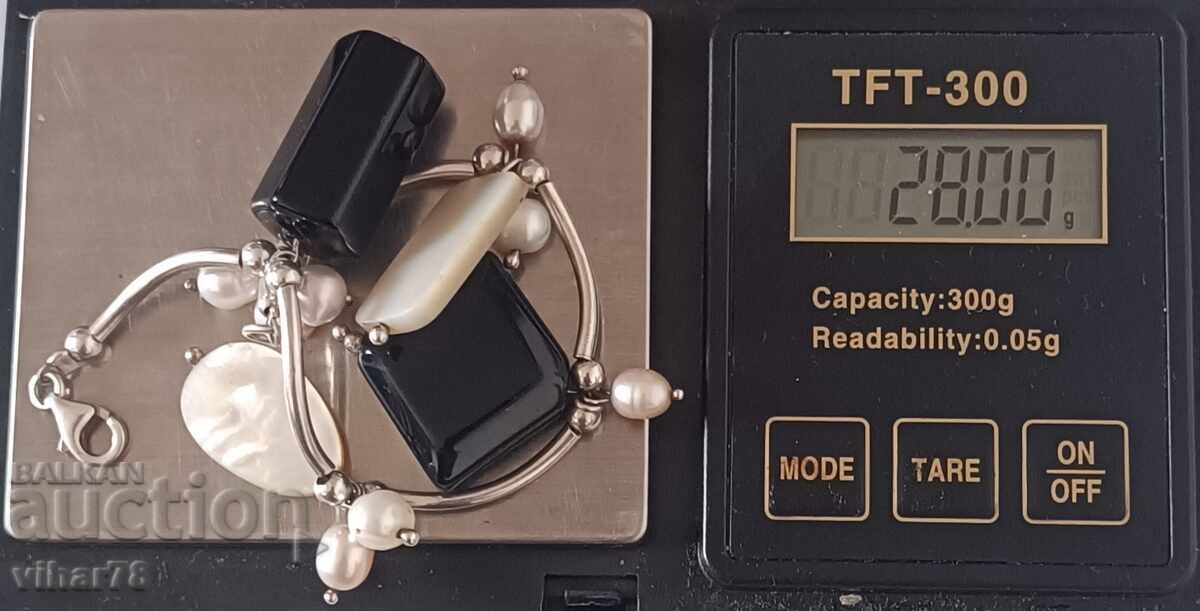 Auction silver bracelet with onyx, mother-of-pearl and pearls Auction silver bracelet with onyx, mother-of-pearl and pearls