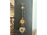 Old wooden thermometer, barometer, wall clock