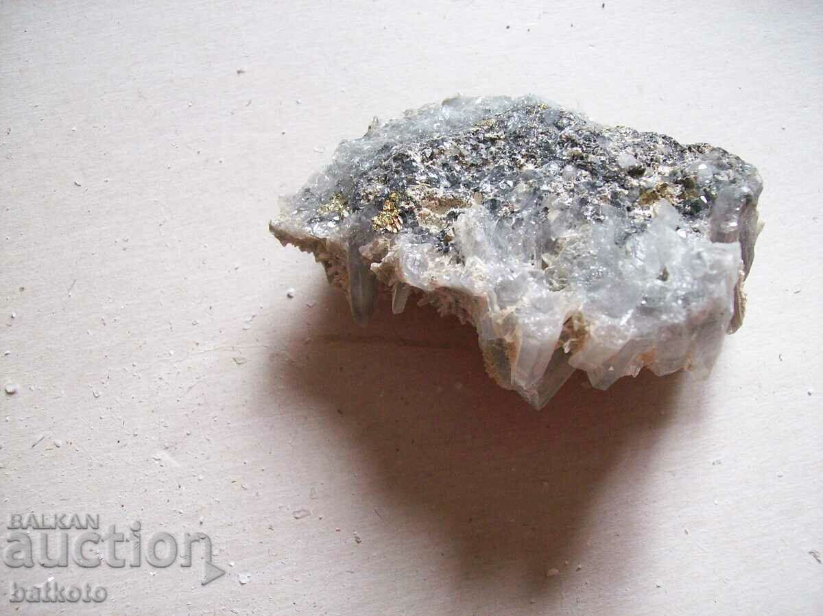 A large crystal with gold flakes at the bottom with price 20.00 BGN | € 10.23