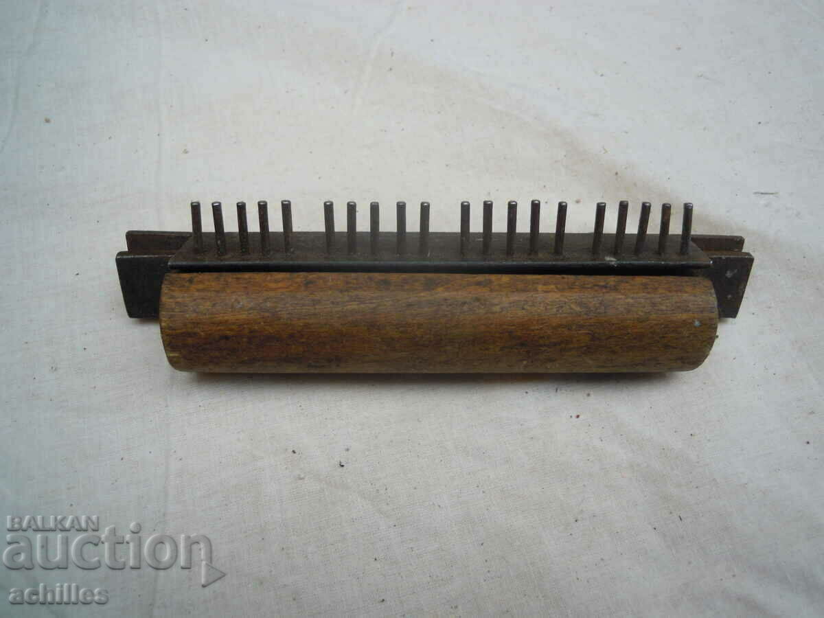 AN OLD TOOL