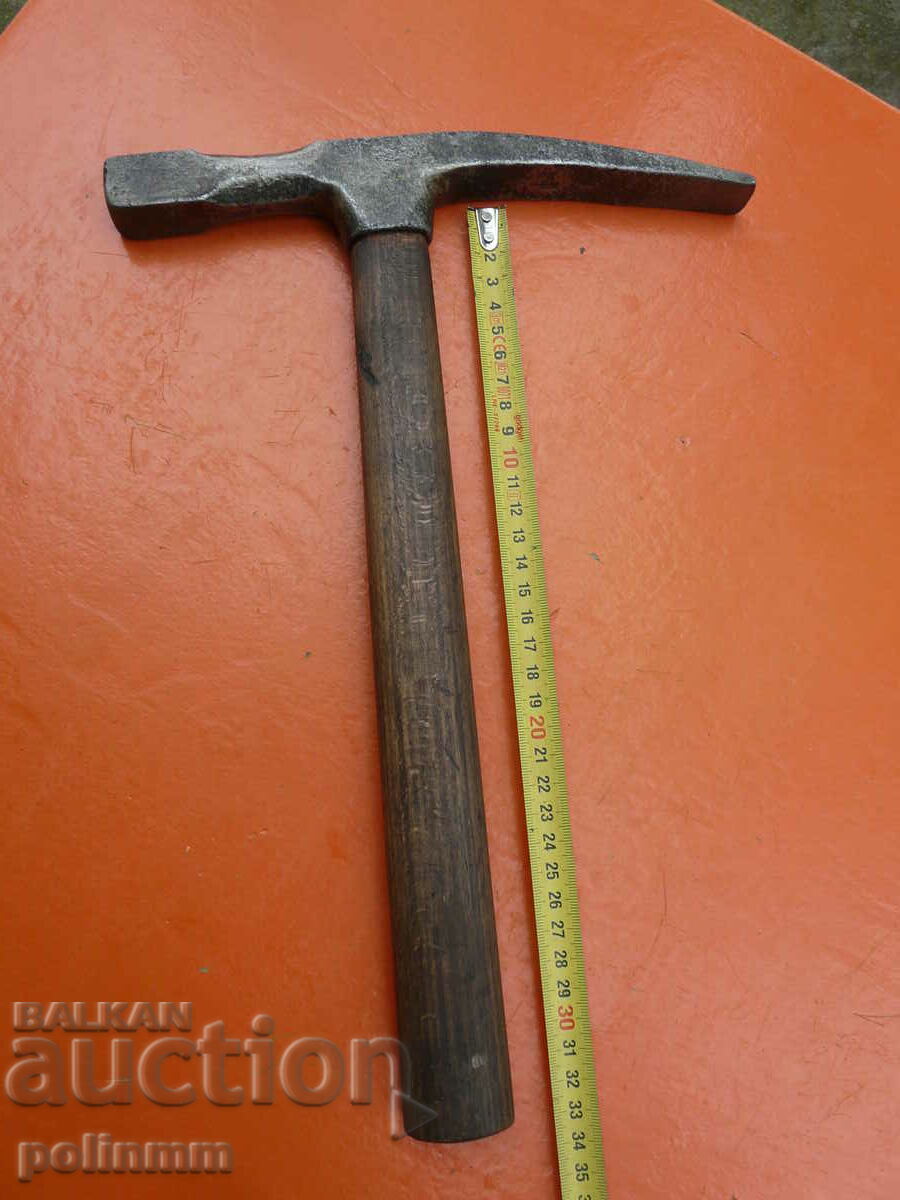 Old stonemason's hammer from 1711