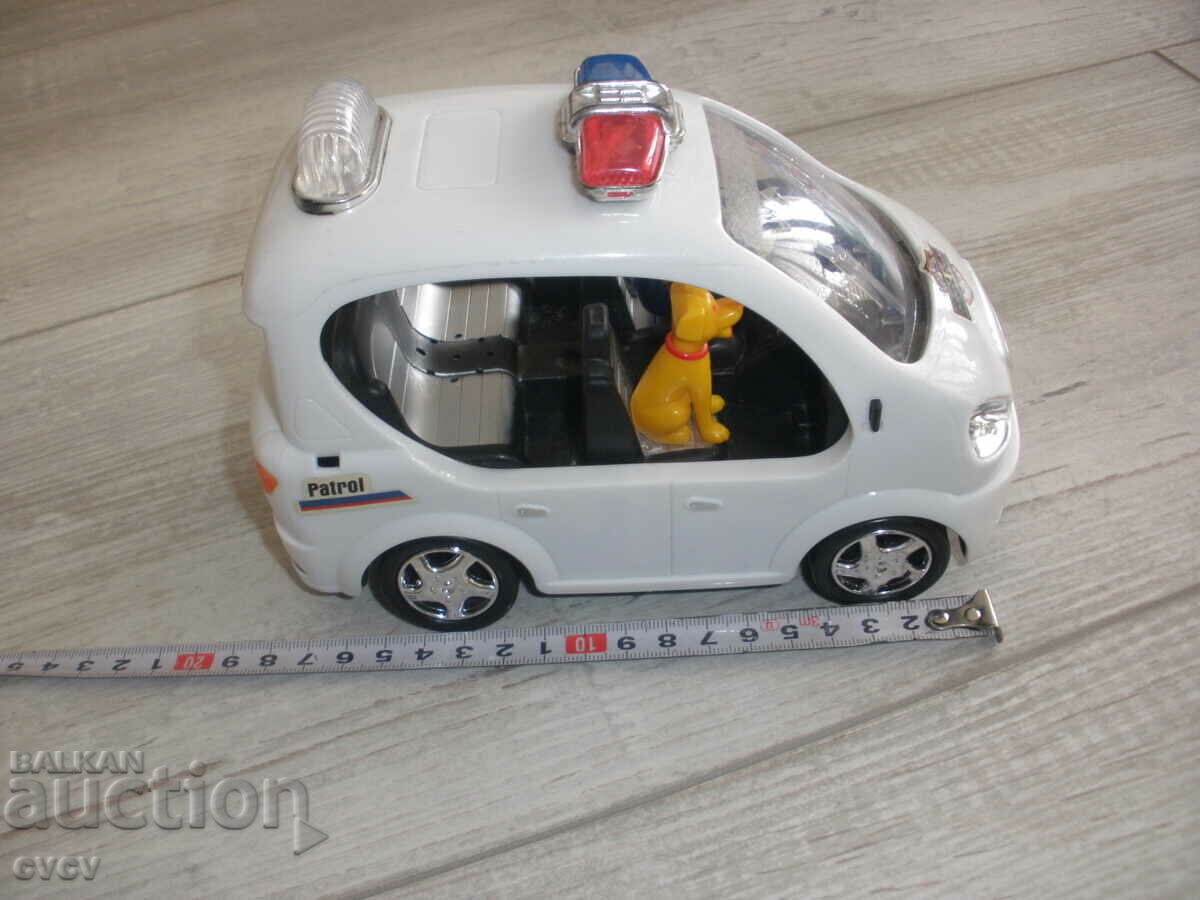 Toy-Police car-lights up and plays