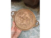Embossed bronze plate