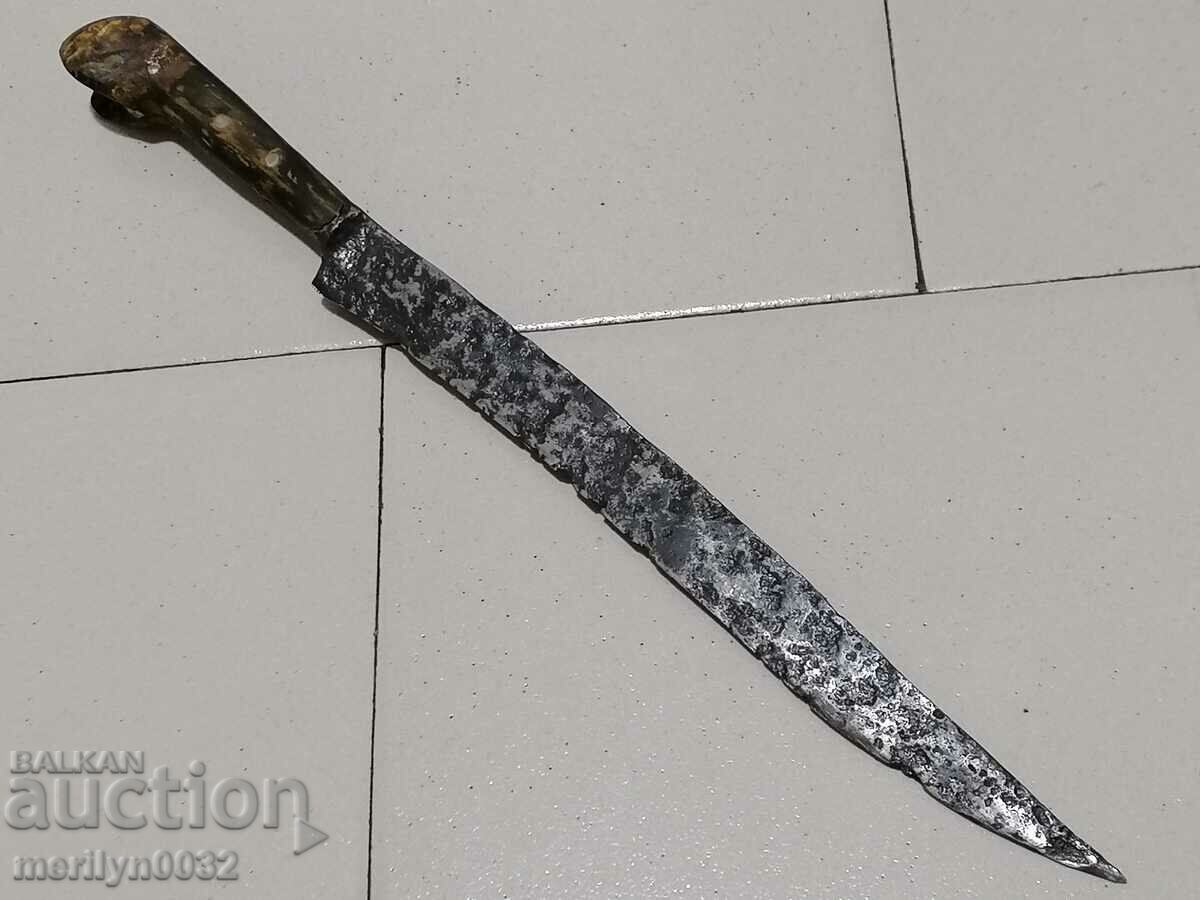 An old shepherd's knife without a kaniya, carved from a karakulak horn, a dagger