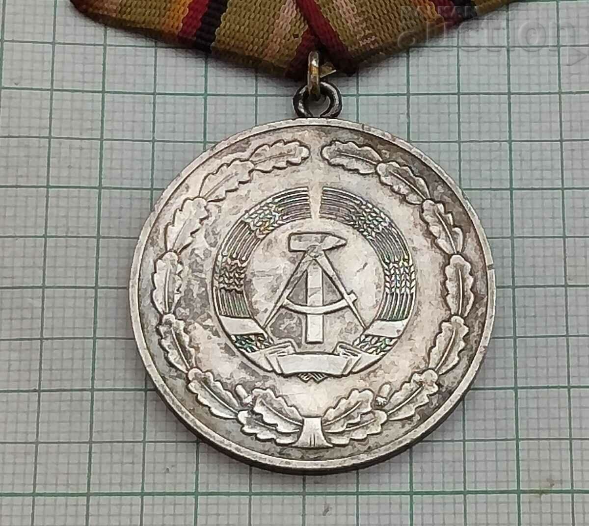 Delivery of GDR FOR EXCELLENT SERVICE IN THE PEOPLE'S ARMY SILVER MEDAL Delivery of GDR FOR EXCELLENT SERVICE IN THE PEOPLE'S ARMY SILVER MEDAL