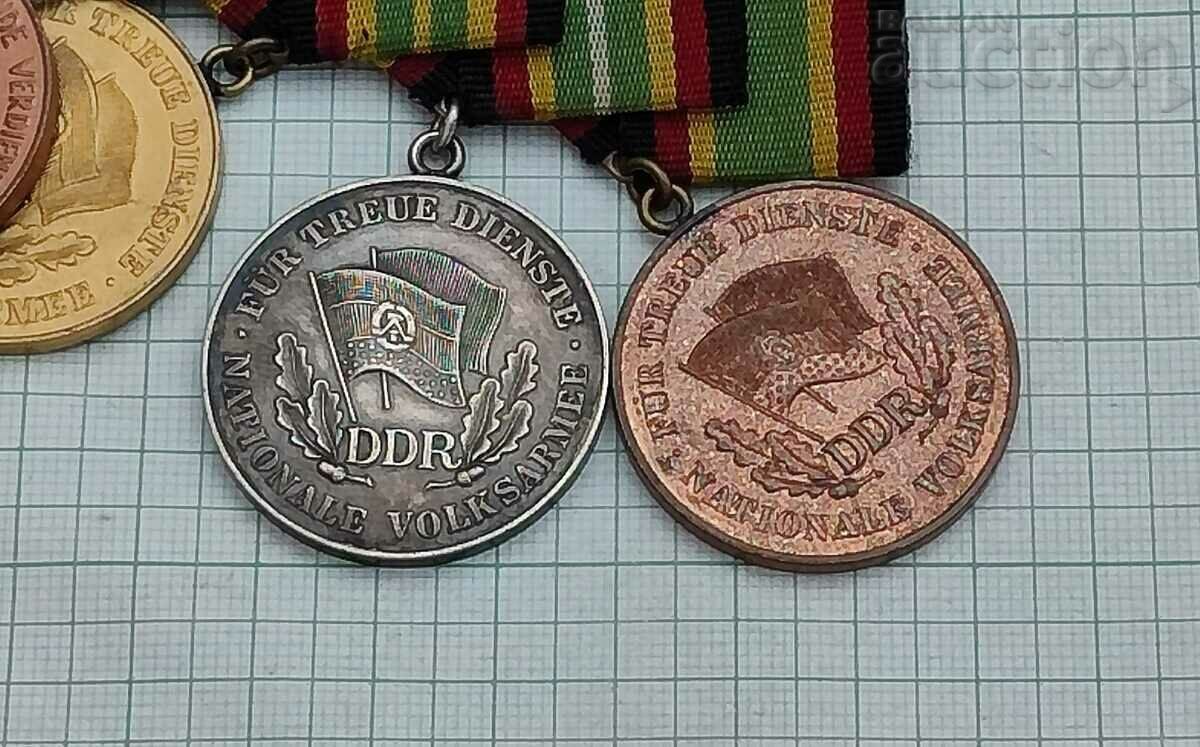 Auction GDR EXCELLENT/FAITHFUL SERVICE IN THE PEOPLE'S ARMY 5 MEDAL BLOCK Auction GDR EXCELLENT/FAITHFUL SERVICE IN THE PEOPLE'S ARMY 5 MEDAL BLOCK