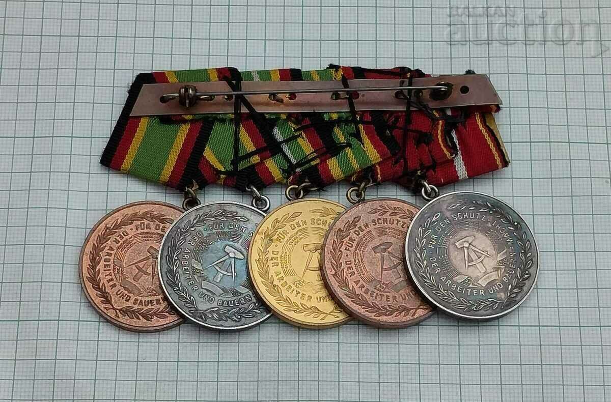 Delivery of GDR EXCELLENT/FAITHFUL SERVICE IN THE PEOPLE'S ARMY 5 MEDAL BLOCK