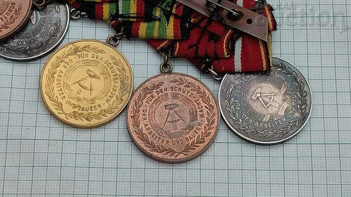 GDR EXCELLENT/FAITHFUL SERVICE IN THE PEOPLE'S ARMY 5 MEDAL BLOCK - 6 GDR EXCELLENT/FAITHFUL SERVICE IN THE PEOPLE'S ARMY 5 MEDAL BLOCK - 6