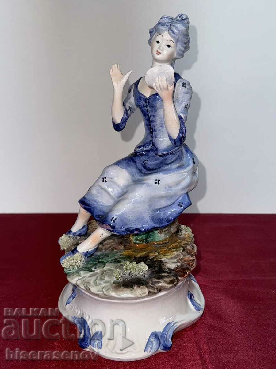 A beautiful porcelain figure with markings