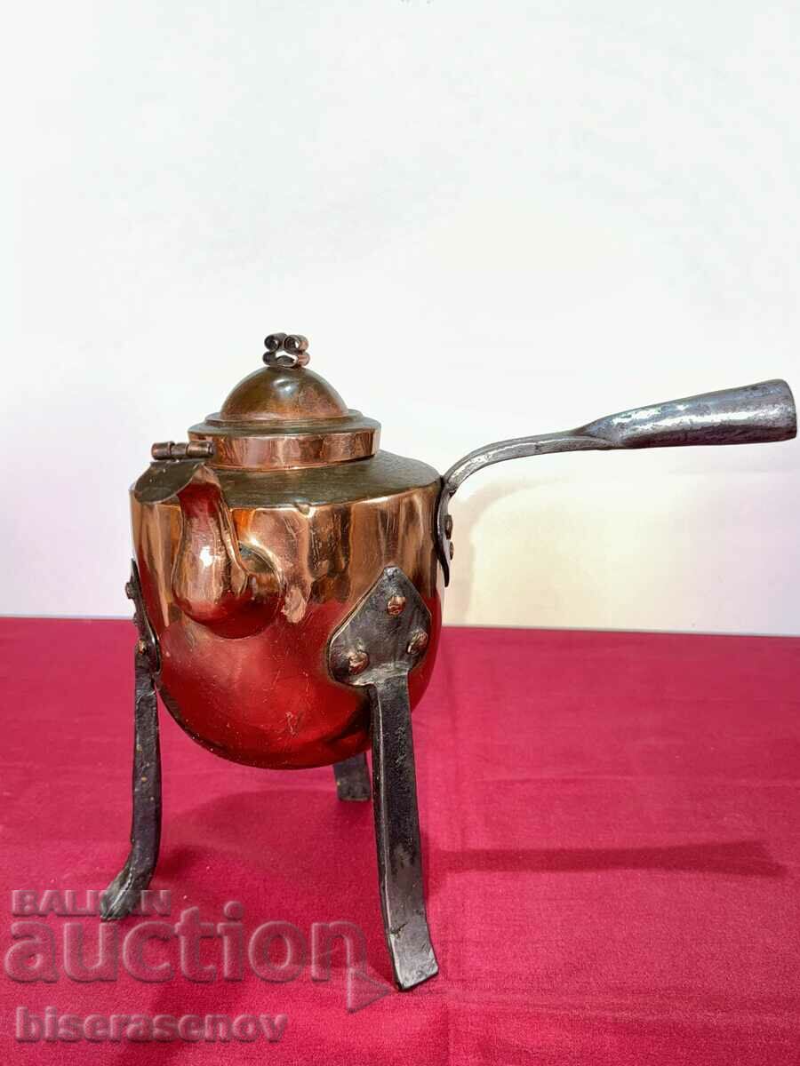 Old copper and iron kettle