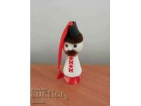 Figure of a guy in folk costume - Russian souvenir