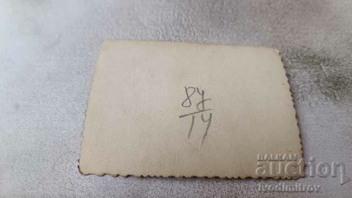 Photo Sofia Men and women on the sidewalk on Tsar Boris III Blvd with price 2.45 BGN | € 1.25 Photo Sofia Men and women on the sidewalk on Tsar Boris III Blvd with price 2.45 BGN | € 1.25