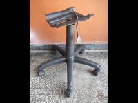 Cross chair with wheels, shock absorber and mechanism for an office chair