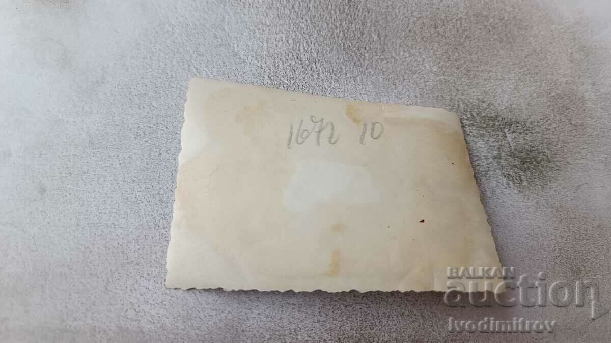 Photo A man and two young girls on the beach with price 1.65 BGN | € 0.84 Photo A man and two young girls on the beach with price 1.65 BGN | € 0.84