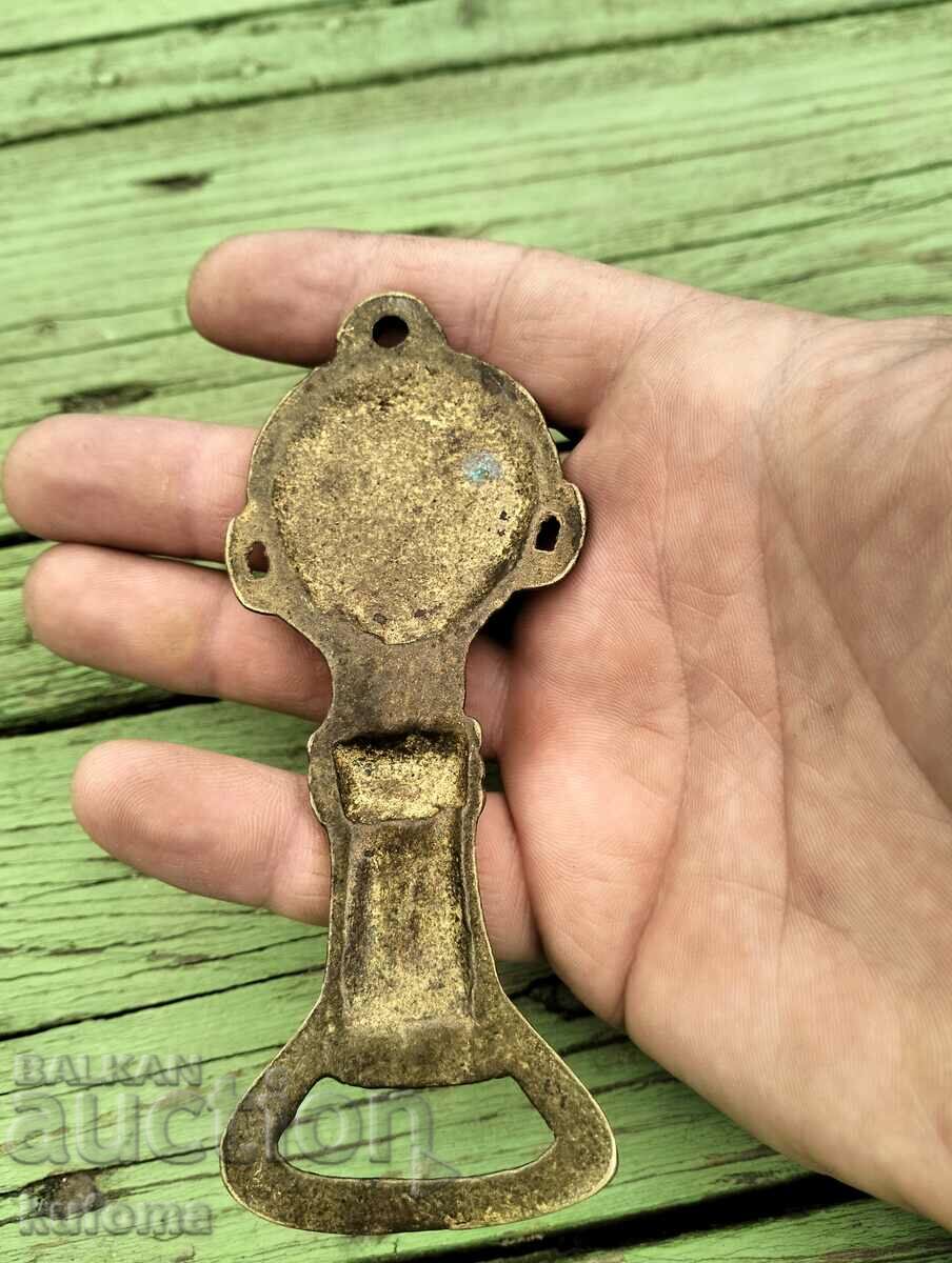 Delivery of Old bronze bottle opener Delivery of Old bronze bottle opener