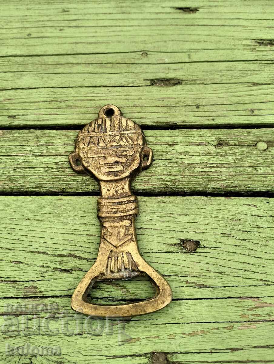 Old bronze bottle opener