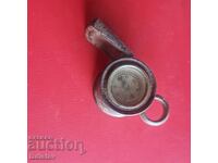 Old tourist whistle with compass
