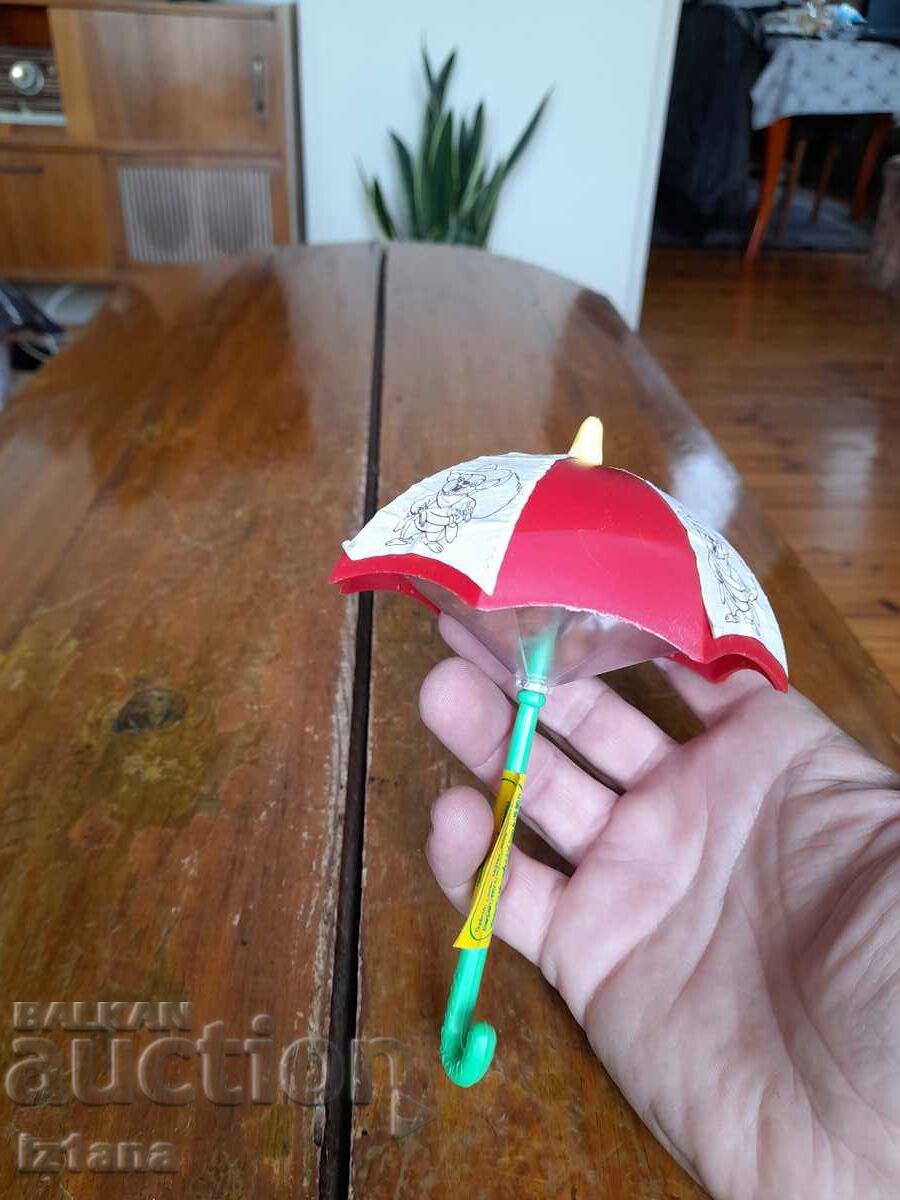 Auction  An old Saborji umbrella with candies