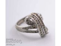 Ring with white zircons