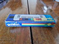 Old toy, musical instrument, Goldon Bandy harmonica