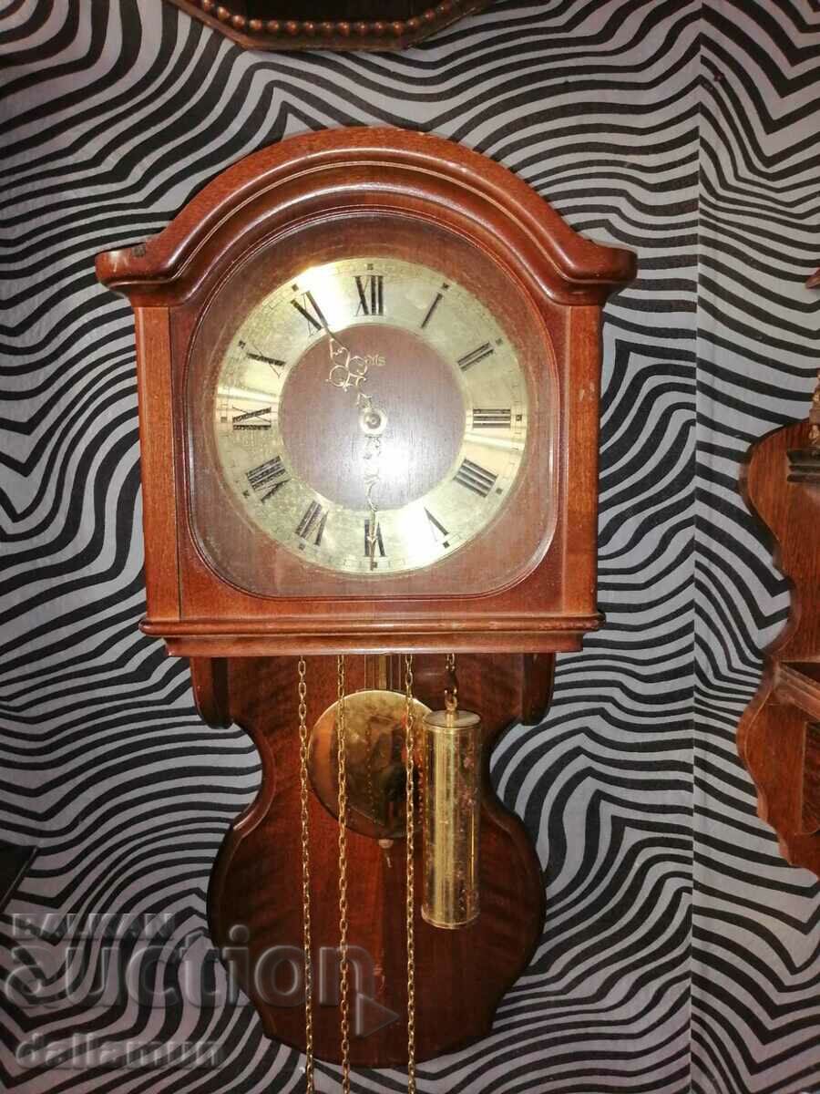Old wooden wall clock