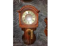 Old wooden wall clock