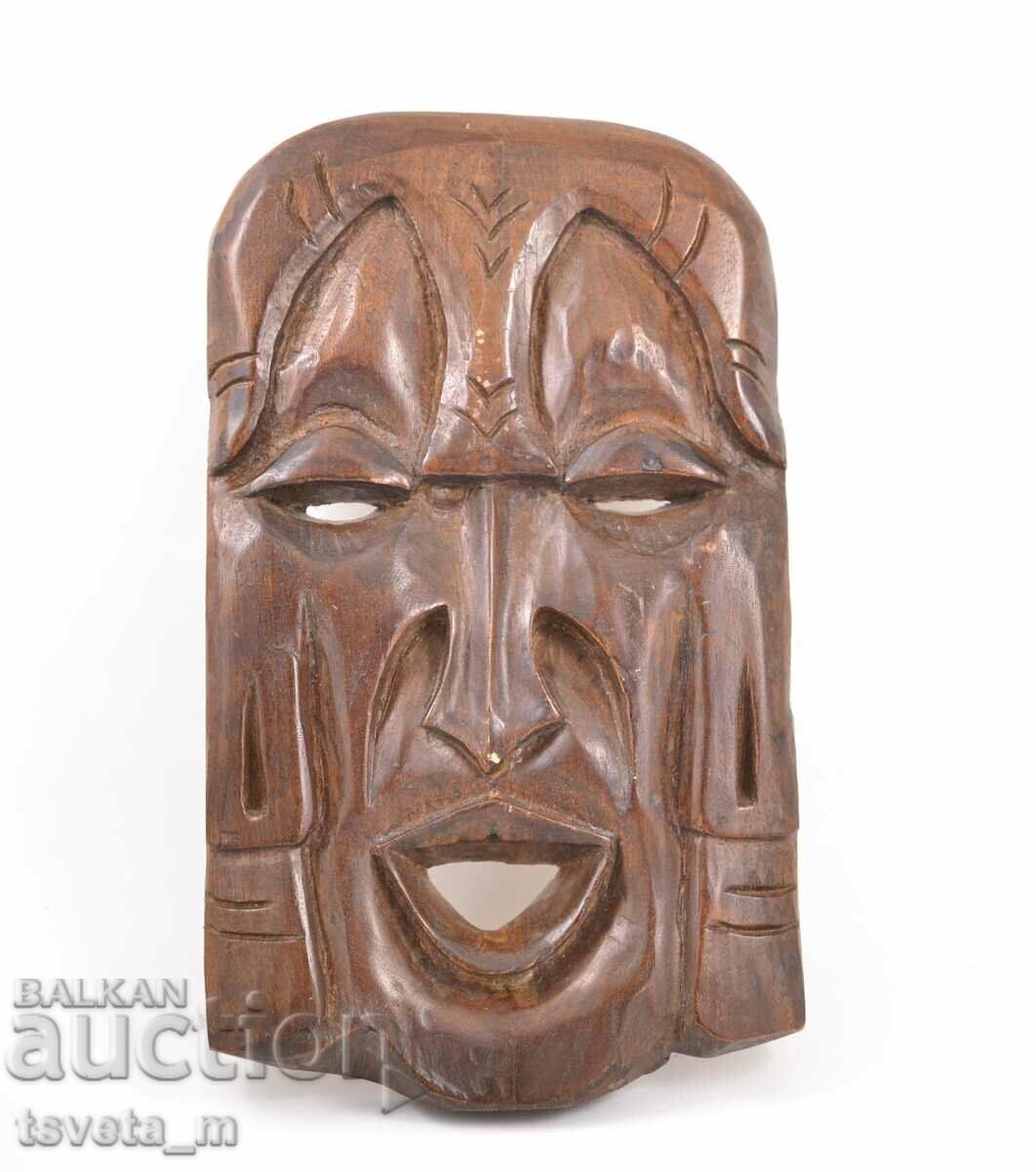 Wooden mask, wood carving
