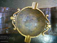 Antique ashtray on leather belt (England)