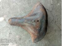 Old leather bicycle seat.