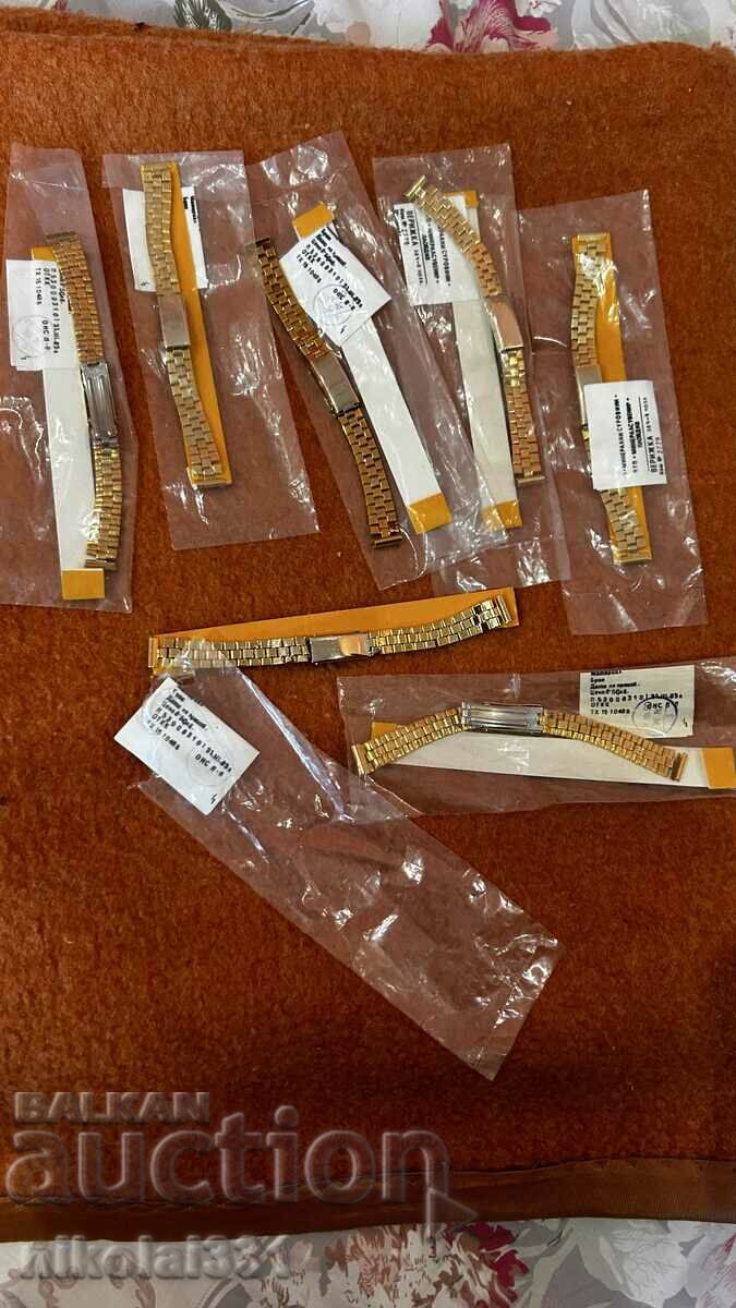 Brand new watch straps, gold plated, 7 pieces