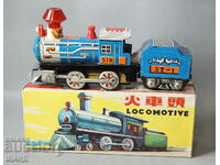 Old metal toy model train locomotive with box