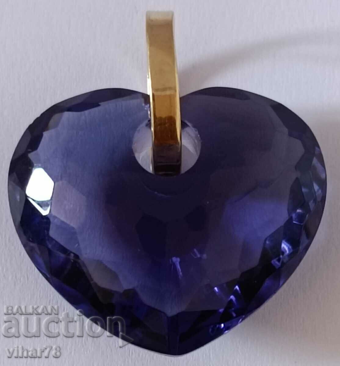 Heart pendant with 18 carat gold holder