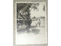 Bulgaria & Old photo photography & Two women and a boy sit...