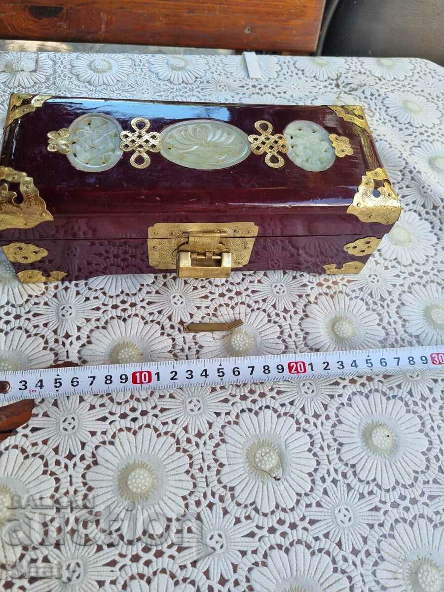Old wooden jewelry box with padlock