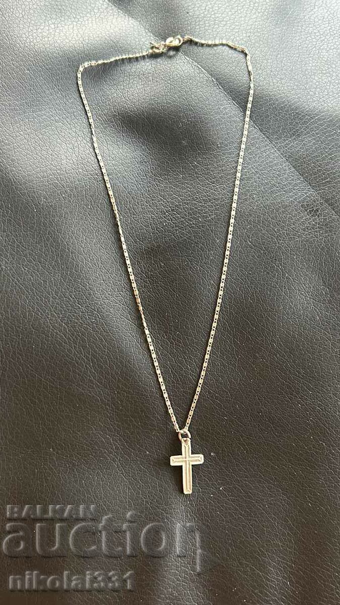 Women's silver necklace with a cross