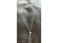 Women's silver necklace with a cross