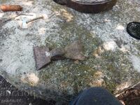 Old forged stonemason's hammer