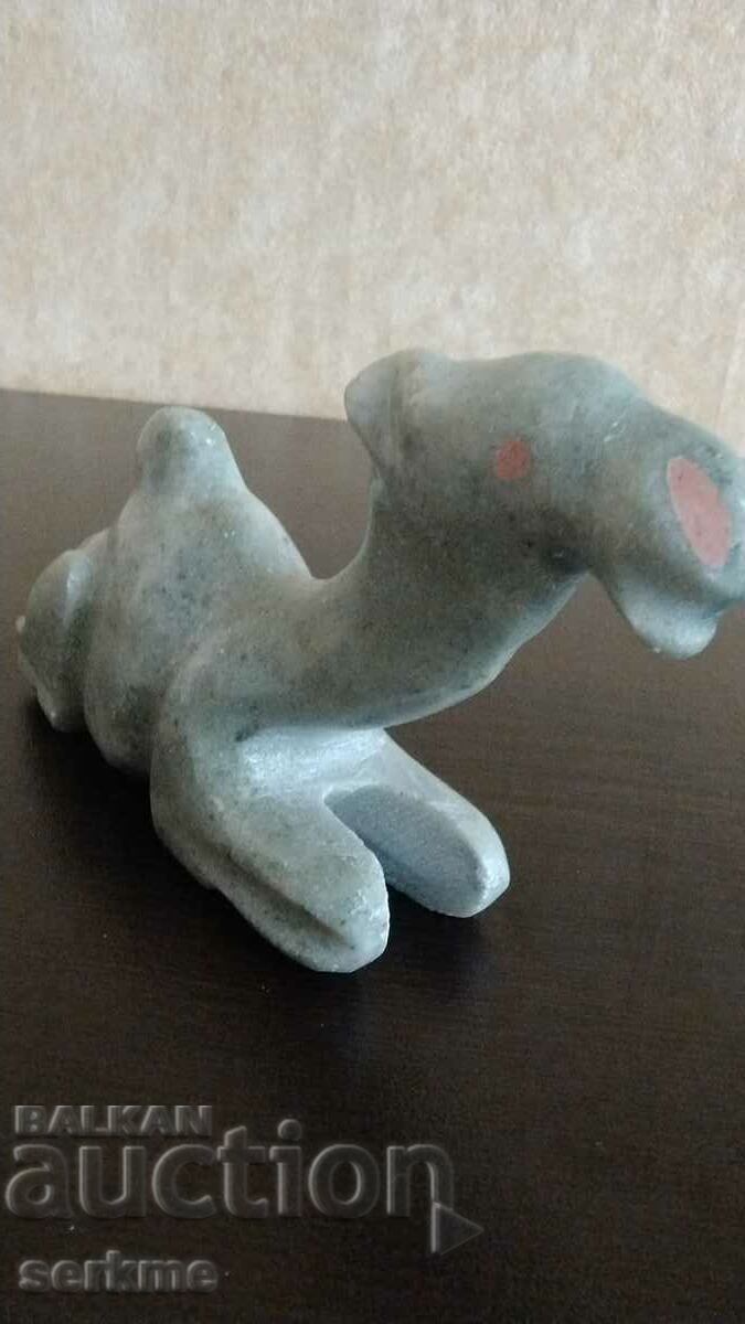 Μια πέτρινη φιγούρα με τιμή 10.00 BGN | € 5.11