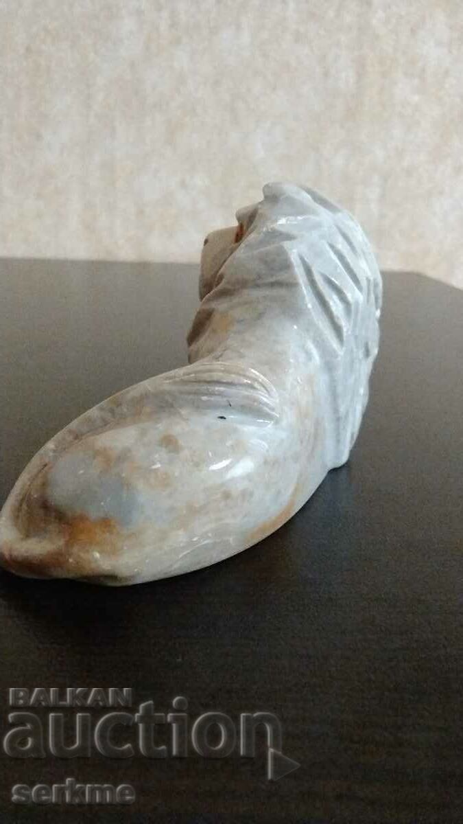 Παράδοση Μια πέτρινη φιγούρα