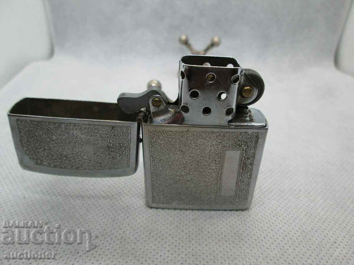 Delivery of OLD ZIPPO PETROL LIGHTER Delivery of OLD ZIPPO PETROL LIGHTER
