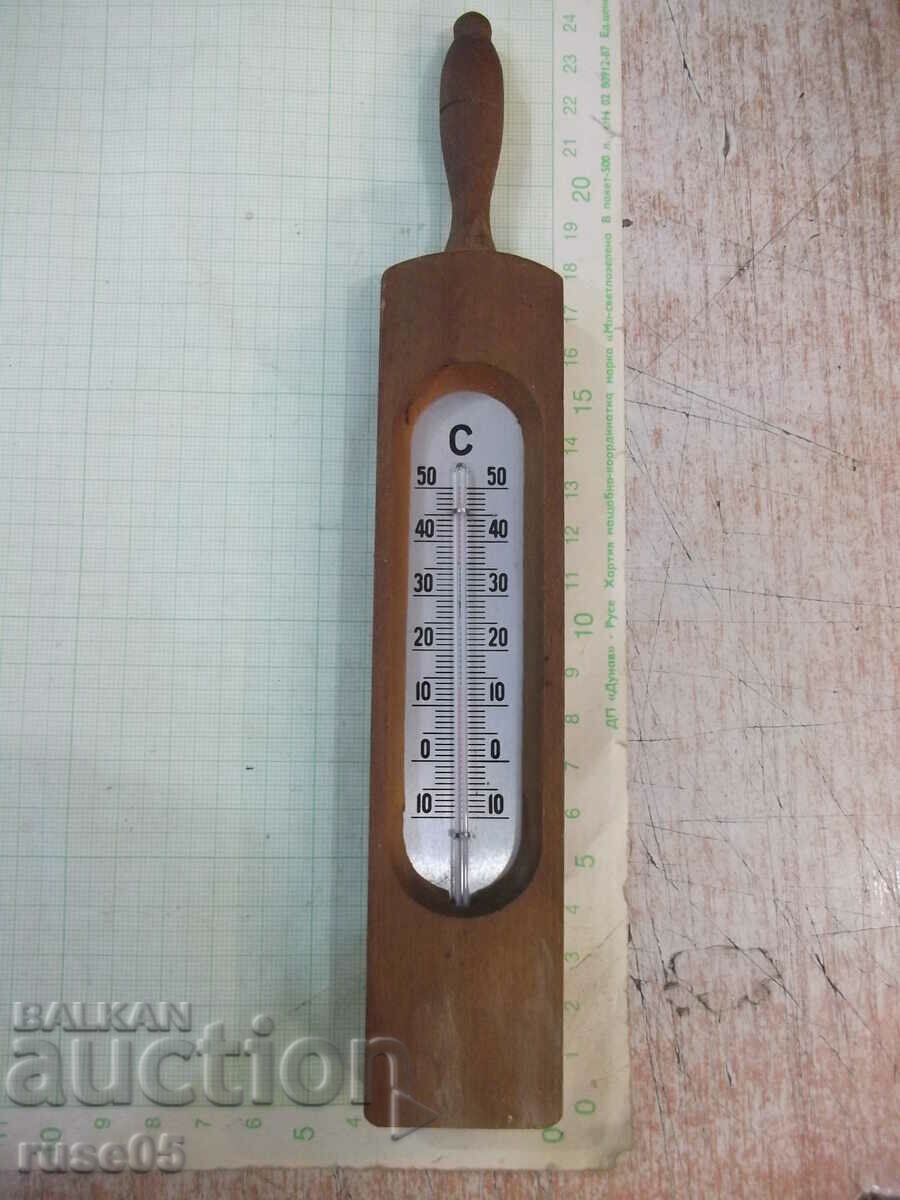 Thermometer in a wooden frame