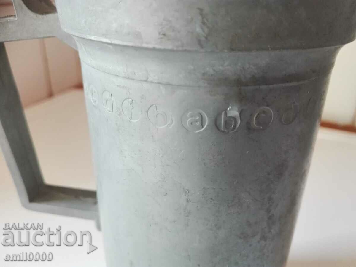 Auction  Metal Mug 1